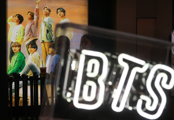 BTS advertisement at Lotte Duty Free in downtown Seoul. [YONHAP]