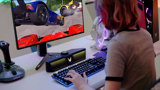 A model plays games using LG Electronics' new LG UltraGear gaming speakers released on Monday. The new speaker model has internally installed microphones that allow gamers to communicate without wearing a separate set of microphones. [LG ELECTRONICS]