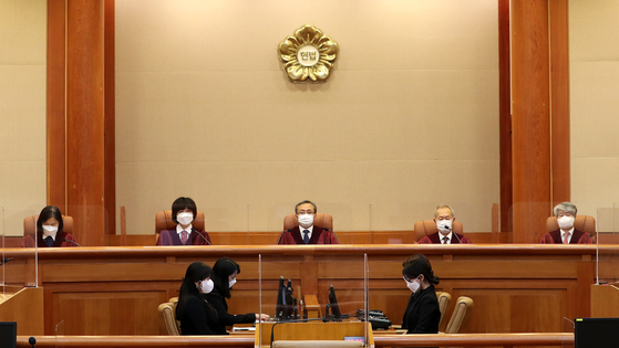 Constitutional justices sit to announce their ruling on a constitutional petition filed by a Korean conscripted by Japan during the colonial period and convicted as a war criminal. [NEWS1]