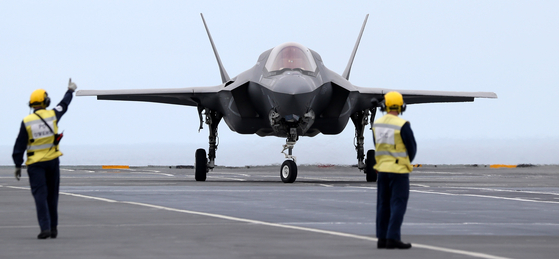 An F-35B stealth fighter jet prepares for takeoff as the British aircraft carrier HMS Queen Elizabeth and its fleet sailed in the East Sea Tuesday for a joint marine drill with Korea for humanitarian and disaster relief missions. [JOINT PRESS CORPS]