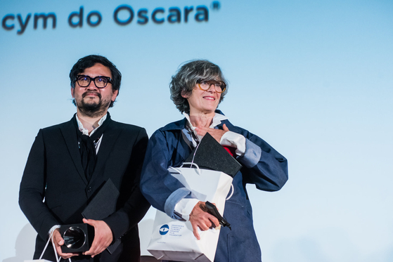 Directors Oan Kim, left, and Brigitte Bouillot received Silver Horn Award at the Krakow Film Festival in Poland in June. [KRAKOW FILM FESTIVAL] 