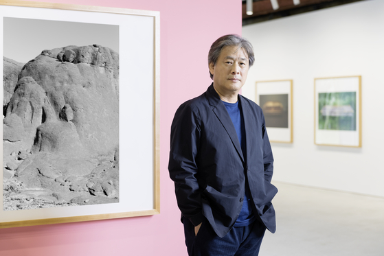 Filmmaker-turned-photographer Park Chan-wook poses for photos prior to the opening of his first solo exhibition ″Your Faces″ in Kukje Gallery, Busan. [KUKJE GALLERY]