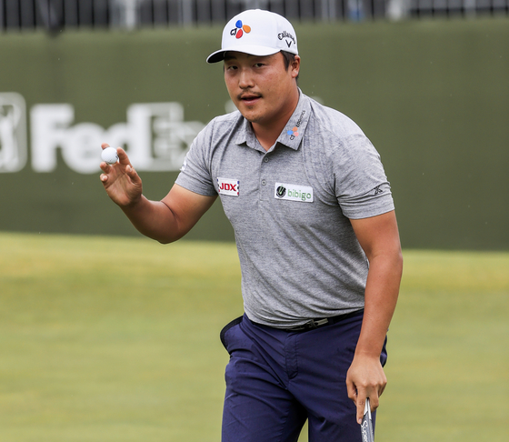 Lee Kyoung-hoon holds his ball after putting for a birdie on the 17th green during the fourth round of the AT&T Byron Nelson golf tournament at TPC Craig Ranch in McKinney, Texas on May 16. Lee won the tournament. [EPA/YONHAP]