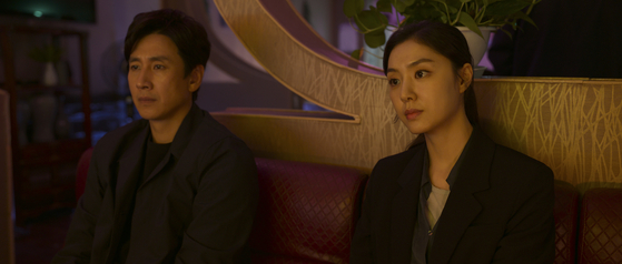 Top and above: Actors Park Hee-soon, top right, and Seo Ji-hye, above right, feature as investigators looking into Se-won's family. [APPLE TV+]