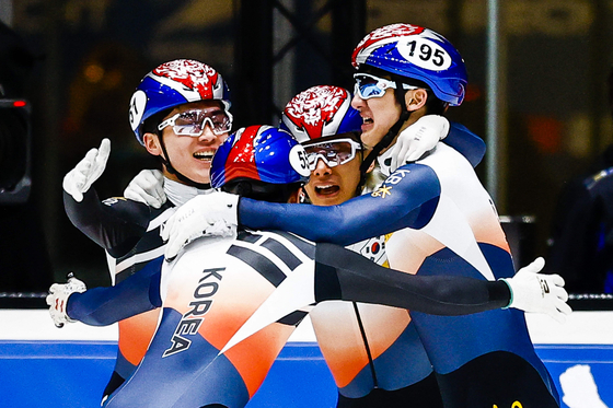 Park Jang-hyuk, Park In-wook, Kwak Yoon-gy and Kim Dong-wook celebrate after winning the gold medal in the men's 5000-meter relay in the fourth round of the 2021–22 ISU Short Track Speed Skating World Cup in Dordrecht, in the Netherlands, on Sunday. [AFP/YONHAP]