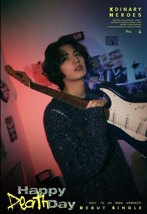 Bassist Juyeon of Xdinary Heroes is featured on the poster to announce the band's debut [JYP ENTERTAINMENT]