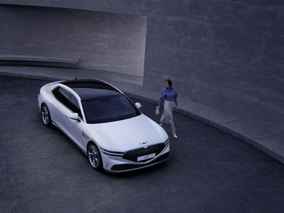 A promotional image for the latest edition of the Genesis' G90 sedan, introduced by Genesis on Tuesday. Orders for the G90 will open Friday, with the G90 sedan beginning at 89.6 million won ($75,720) and the G90 long wheel base model beginning at 166 million won. [HYUNDAI MOTOR]