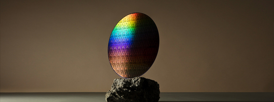 A wafer fitted with a new chip design called VTFET, which is jointly developed by IBM and Samsung Electronics [IBM]
