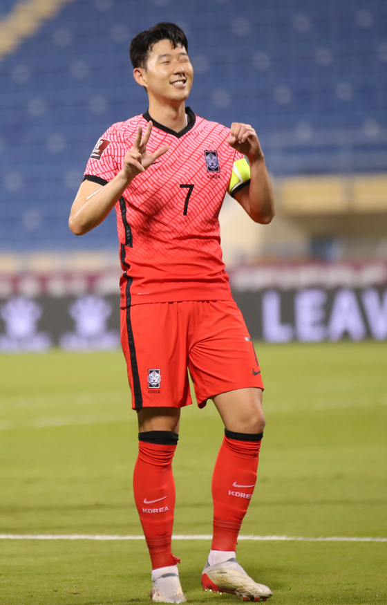 Son Heung-min celebrates scoring a penalty at the second leg of the third round of Asian qualifiers for the 2022 Qatar World Cup against Iraq at Thani bin Jassim Stadium in Doha, Qatar, on Nov.17. The goal marks his 30th international goal on the national team. [YONHAP]