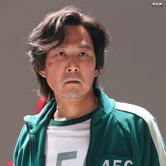 Actor Lee Jung-jae as Seong Gi-hun in the Neflix Korea series ″Squid Game.″ [ARTIST COMPANY]
