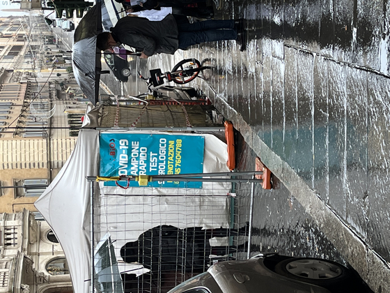 People line up for a rapid antigen Covid-19 test outside a pharmacy in Rome last month.