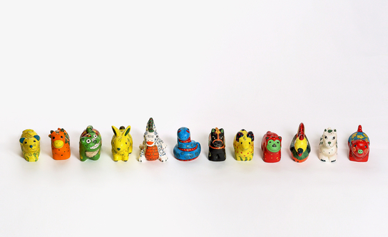 These ceramic dolls were inspired by the 12 Chinese zodiac animals in Gyeongbok Palace's Geunjeongjeon Hall. [PARK SANG-MOON]