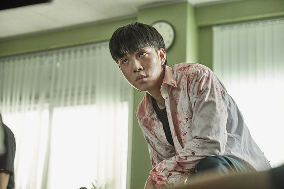 Actors Lee You-mi, top, and Yoo In-soo portray the villains Na-yeon and Gwi-nam in the Netflix Korea original "All of Us Are Dead." [NETFLIX]