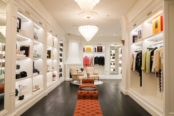Luxury clothes and bags are displayed at BGZT Lab by Bungaejangter, a store run by secondhand marketplace Bungaejangter that sells pre-owned designer products. Shinsegae's Signite Partners invested an undisclosed amount in the company in January, which could lead to possible partnerships. [LEE SO-AH]