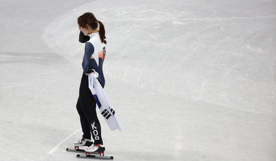 Choi Min-jeong reacts after winning the women's 1,000-meter silver medal at the 2022 Beijing Games on Friday. [JOONGANG ILBO]