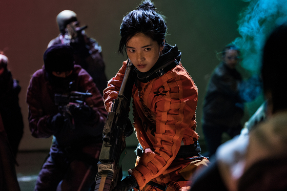 Kim as Captain Jang, an ex-special forces squad officer who leads her space ship and crew in sci-fi film "Space Sweepers" [NETFLIX]