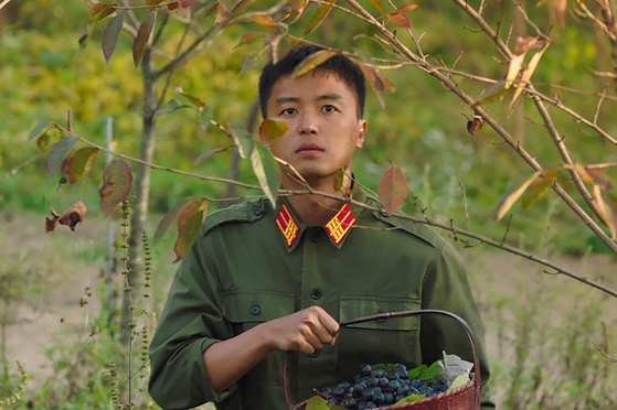 Yeon as Moo-kwang, a once simple-minded soldier whose sole purpose lay in getting a promotion so that he could secure a stable life for him and his family [JNC MEDIA GROUP]