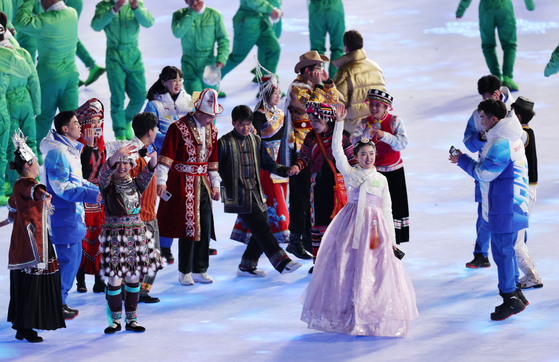 A woman wearing hanbok, or traditional Korean attire, appeared during the 2022 Beijing Olympics' opening ceremony on Feb. 4, for a parade of representatives from ethnic minorities in China. [YONHAP]
