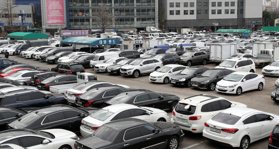 Used cars are parked at a lot in Jangan-dong, central Seoul. [NEWS1]