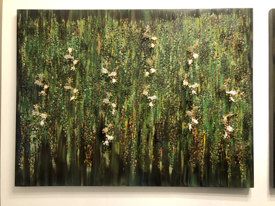 Artist Chae Rimm's 3-D sculptural paintings express the passage of time, like the process of a tree growing or flowers blooming. [SHIN MIN-HEE]