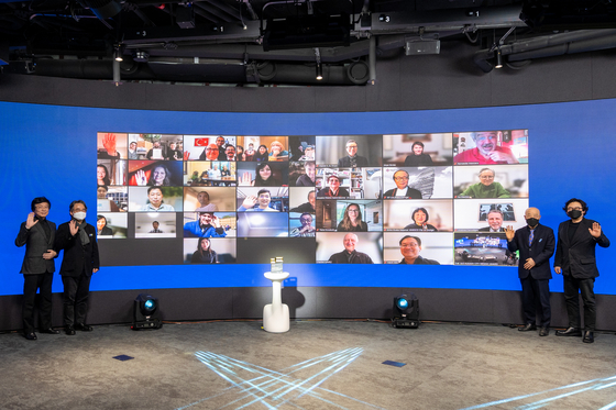 The winners of the 3rd Human City Design Award pose with committee members of the event on Monday evening. [SEOUL DESIGN FOUNDATION]