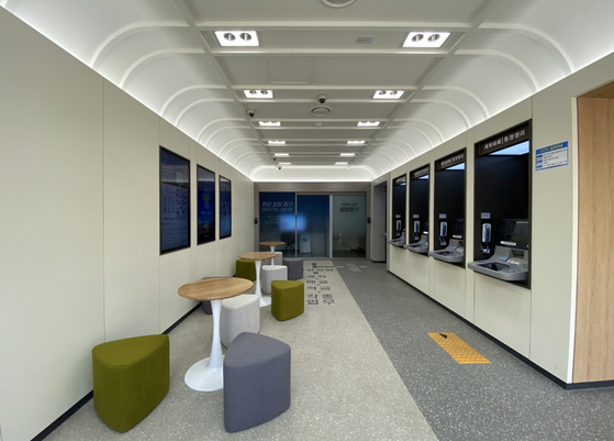 Woori Bank's "Digital Express" automated bank branch in Ui-dong, Gangbuk District, northern Seoul. Woori Bank announced Monday it opened an automated bank branch, where customers can have a virtual consultation with bank tellers and access other banking services through automated machines. [WOORI BANK]