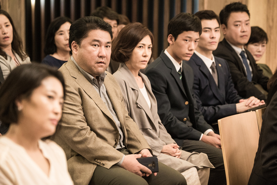 The parents of the four students accused of school violence privately gath- er and plan to destroy all the evidence that pertains to their children. [MINDMARK]
