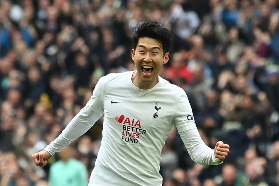Tottenham Hotspur's Son Heung-min celebrates after scoring his team's second goal during a Premier League match against Leicester City at Tottenham Hotspur Stadium in London on Sunday. [AFP/YONHAP]