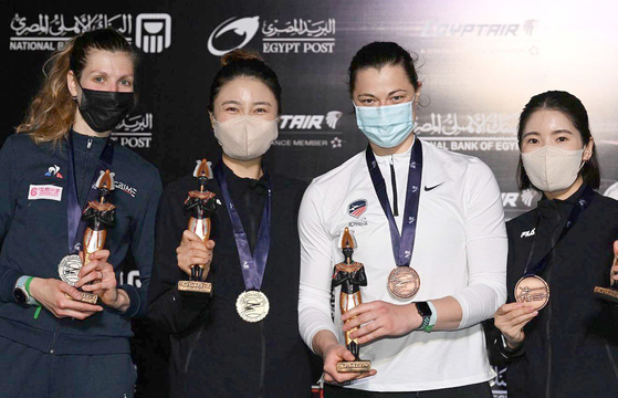 Choi In-jeong, second from left, won the senior women's épée gold medal at the Cairo Epee Grand Prix after beating silver medalist Auriane Mallo of France 15-14 in the finals while countrywoman Song Sera, far right, won the bronze medal after Choi beat Song in the semifinals. Choi is world No. 1 and Song is No. 5 in women's épée. [FIE/YONHAP]