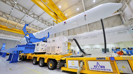 The Korea Space Launch Vehicle-II (KSLV-II) is on a rocket transporter to be rolled out to the launch site on Monday at the launch vehicle assembly building at the Naro Space Center in Goheung County, South Jeolla. The scheduled launch of KSLV-II was delayed a day to Thursday due to strong wind, KARI announced Tuesday. [KARI]]