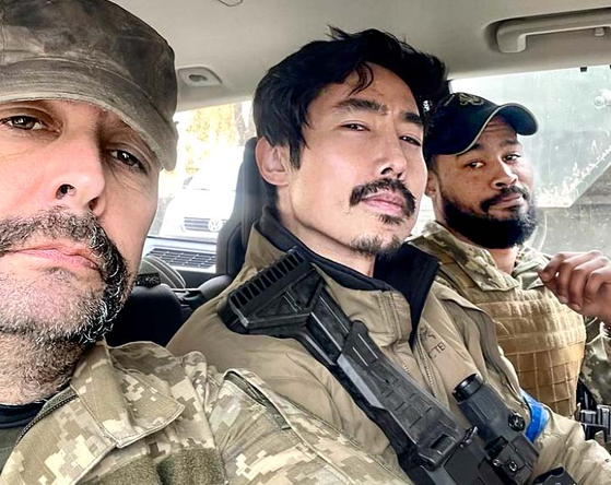 Ken Rhee, second from left, in Ukraine in an Instagram post that Rhee posted in May [INSTAGRAM SCREEN CAPTURE] 