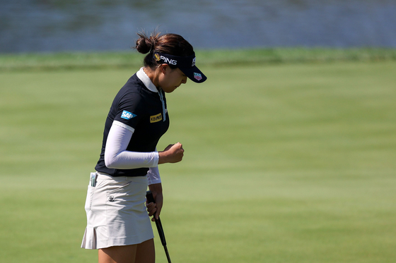 Chun In-gee celebrates making her putt for par on the 18th green to win during the final round of the KPMG Women's PGA Championship at Congressional Country Club on Sunday in Bethesda, Maryland. [AFP/YONHAP]