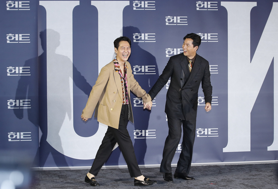 Lee and Jung pose for a photo at the local press event for "Hunt," held at the Megabox Seongsu branch on Tuesday. [NEWS1]