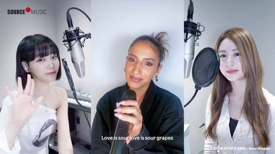 From left, Kim Chae-won, Abir and Huh Youn-jin sing ″Sour Grapes″ from Le Sserafim's debut EP ″Fearless″ [SOURCE MUSIC]