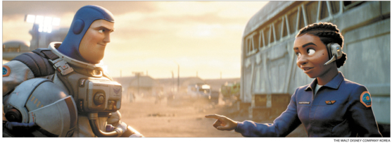 Alisha Hawthorne, right, in a scene from “Lightyear” (2022). The character kisses her wife in the offshoot of the “Toy Story” franchise, prompting several countries to ban the film. [THE WALT DISNEY COMPANY KOREA[