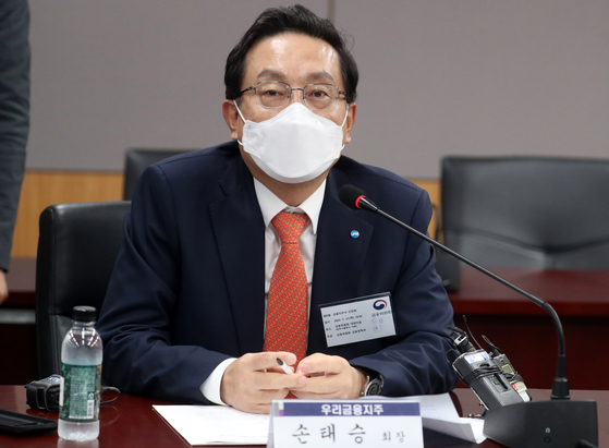 Woori Financial Group Chairman Son Tae-seung speaks at a press conference held in central Seoul on July 21. [NEWS1]