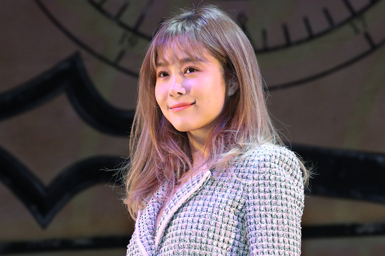 Singer and musical theater actor Ock Joo-hyun smiles during a press conference for a Korean production of "Wicked" at Blue Square in Yonsang District, central Seoul, on Feb. 23, 2021. [YONHAP]
