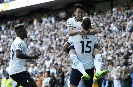 Tottenham Hotspur's Son Heung-min celebrates with Eric Dier and Ryan Sessegnon after Dier scored the club's second goal in a game against Southampton at Tottenham Hotspur Stadium in London on Saturday. [REUTERS/YONHAP]