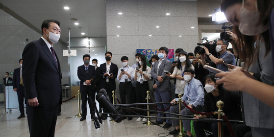 President Yoon Suk-yeol speaks to reporters at the Yongsan presidential office in central Seoul Monday morning. [JOINT PRESS CORPS]