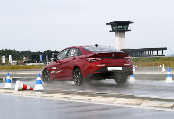 Hyundai's high-performance Veloster N on a slalom course [HYUNDAI MOTOR]