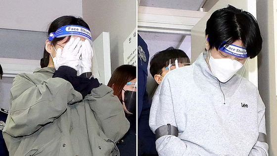 Lee Eun-hae, left, and Cho Hyeon-soo enter the Incheon District Court building in Michuhol District, Incheon, on April 19. [YONHAP]