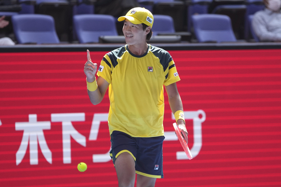Kwon Soon-woo celebrates after beating sixth seed Alex de Minaur of Australia in the Japan Open men's singles round of 32 at the at Ariake Colosseum in Tokyo on Tuesday. [AP/YONHAP]