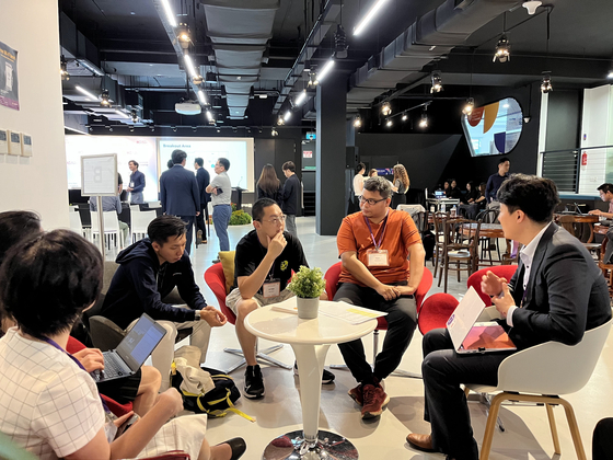 Start-up CEOs take part in the D.Camp meet-up on Tuesday at the Pixel event hall in Singapore. [D.CAMP]