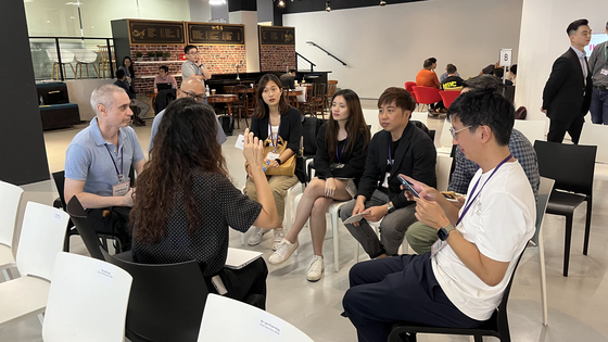 Start-up CEOs take part in the D.Camp meet-up on Tuesday at the Pixel event hall in Singapore. [D.CAMP]