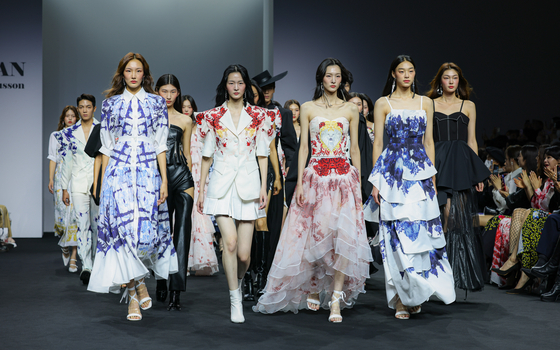 Doucan's collection featured exquisite flower-patterned dresses. [DOUCAN]