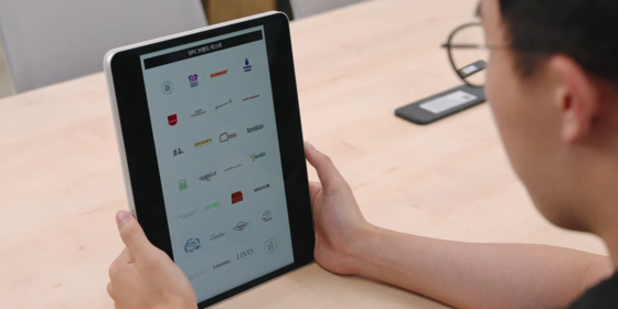 YouTuber ITSub looks at a list of brands affiliated with SPC Group. [SCREEN CAPTURE]