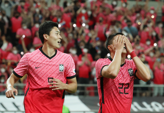 Cho Gue-sung, left, and Kwon Chang-hoon celebrate after Kwon scored for the Korean national team in a game against Egypt at Seoul World Cup Stadium in western Seoul on June 14. Both Cho and Kwon play for K League 1 side Gimcheon Sangmu. [YONHAP] 