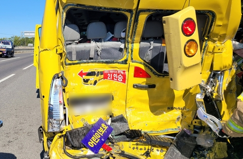 A preschool bus is damaged after being hit by a five-ton truck in Changyeong, South Gyeongsang, on Tuesday morning. [YONHAP] 