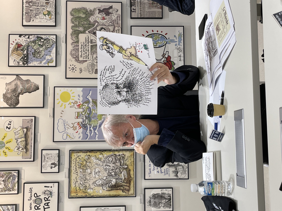 Jean Plantureux, who goes by Plantu, speaks with a group of journalists at the headquarters of Jipyong Brewery in Seoul last Thursday. [ESTHER CHUNG]