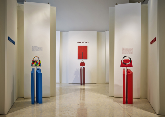 Louis Vuitton's ArtyCapucines handbags on display at southern Seoul's Louis Vuitton Maison Seoul [LOUIS VUITTON] 